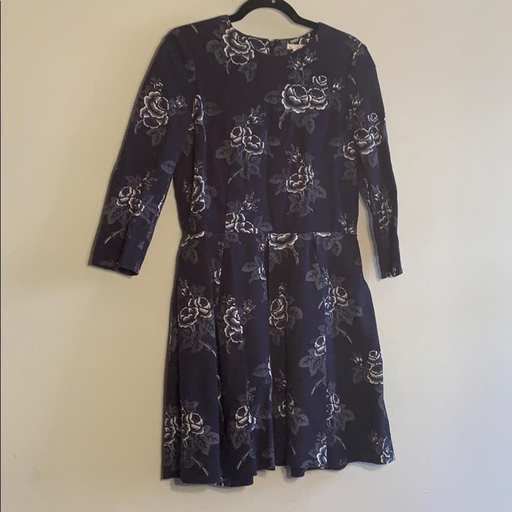 Blue pleated dress with roses